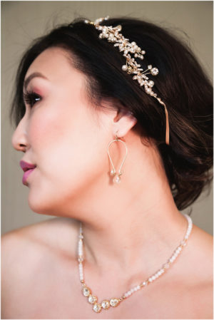 Gown from The Clothes Mine; Headpiece by Luxurious Bridal; Jewelry by Style Avenue Studios; Bouquet by Ambience Floral & Gifts; Hair by Halo Salon & Day Spa; Makeup by Happily Beautiful Makeup Artistry & Skin Studio; Photography by 2 Girls 20 Cameras on location at Kimpton Sawyer Hotel.