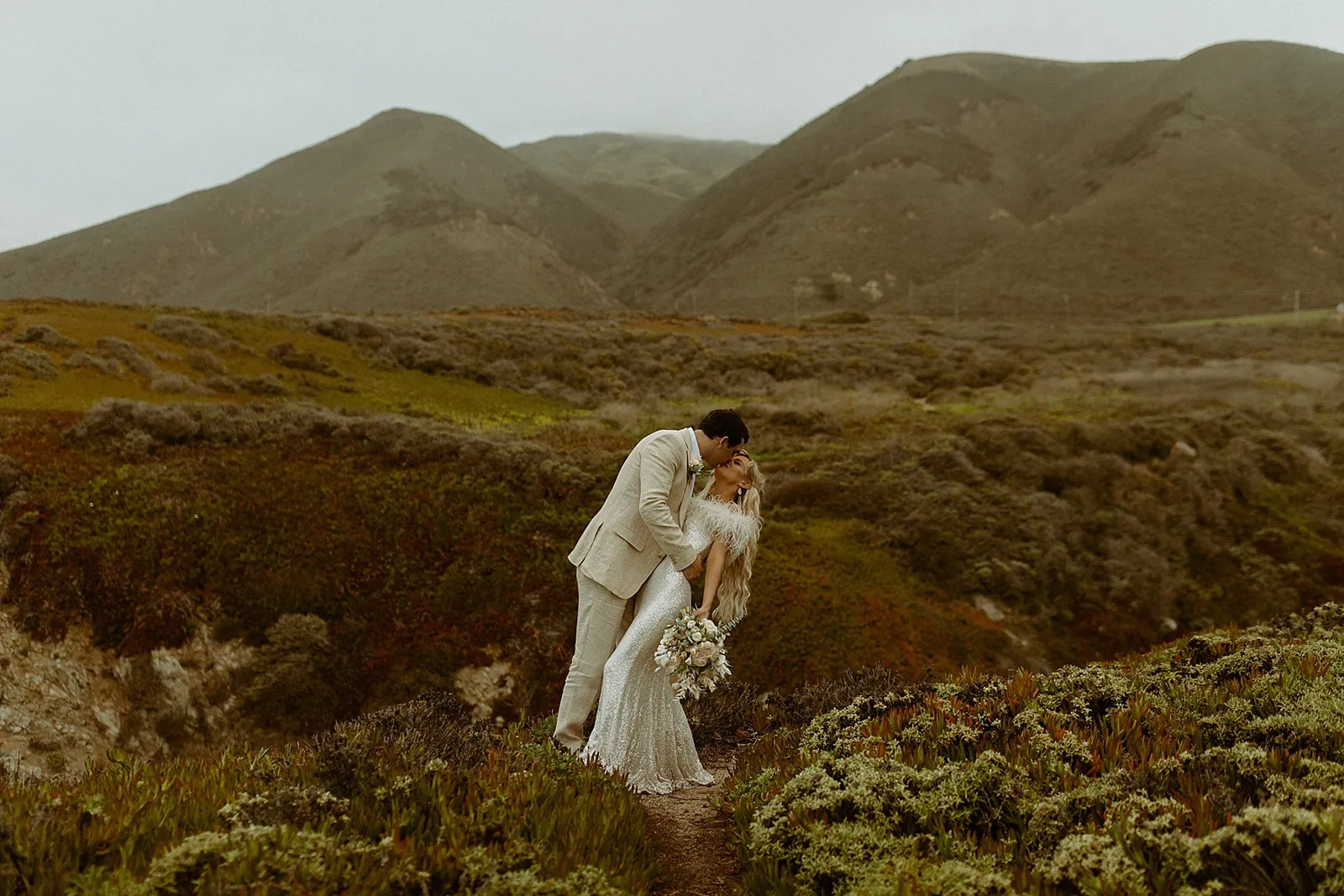 couple kissing in Big Sur