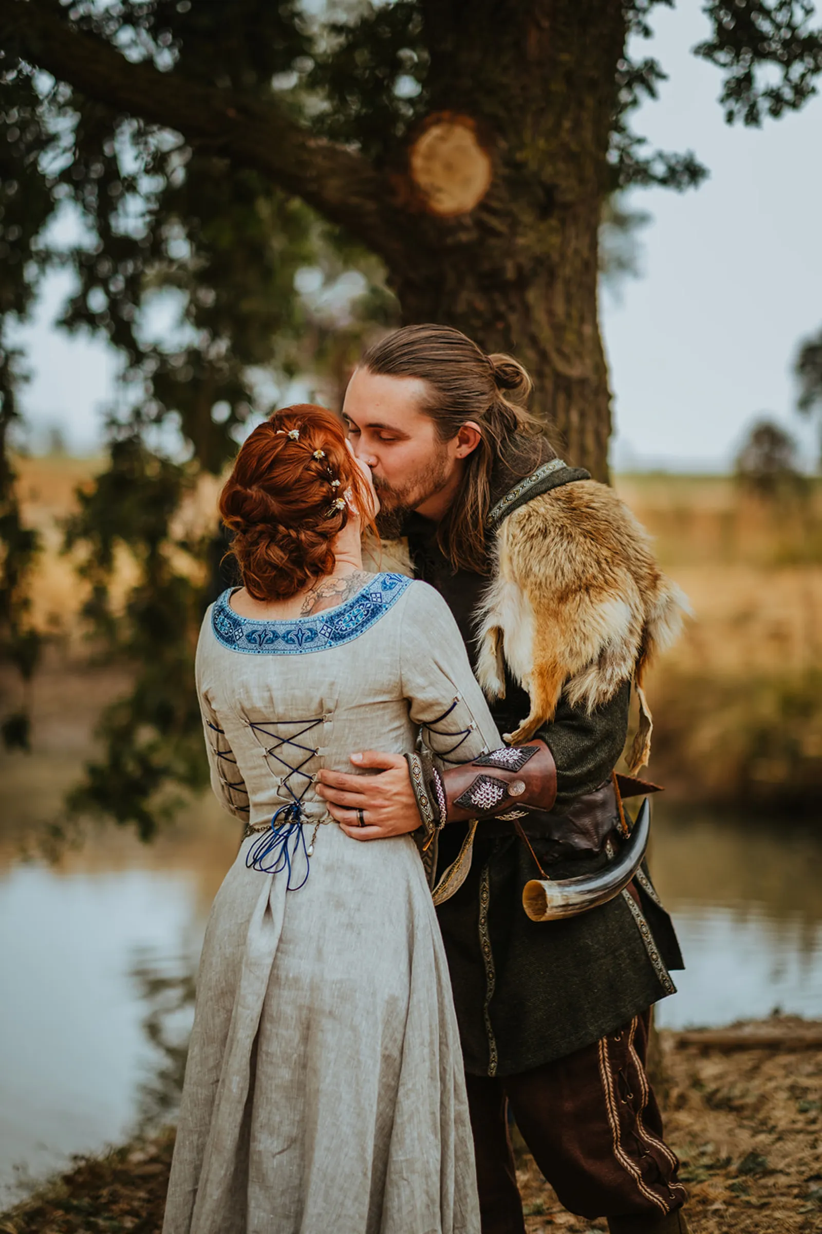 Bride and groom kissing at wedding ceremony