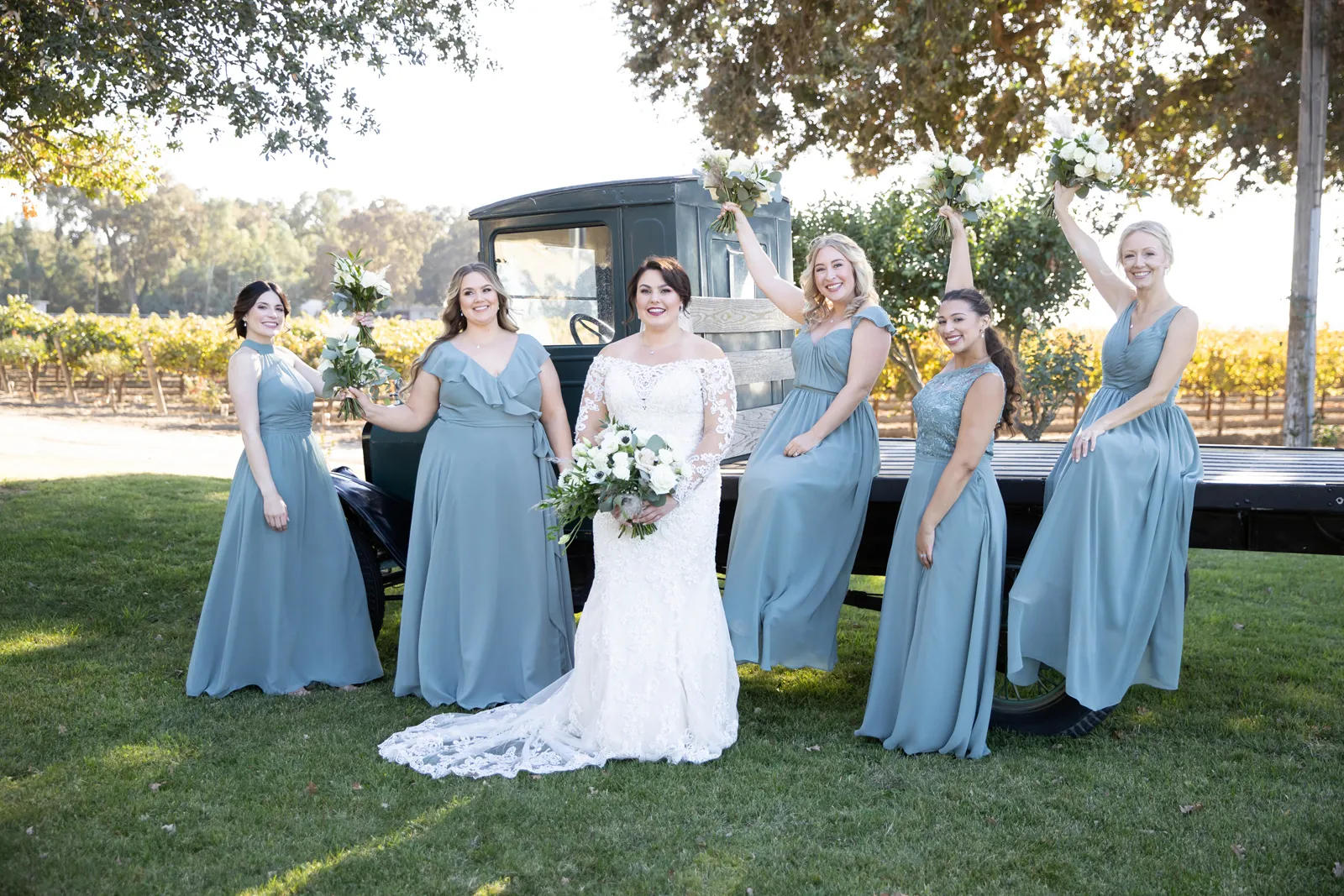 Bride and bridesmaids photography near vintage truck