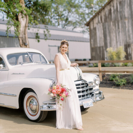Vintage Wedding Car with Beautiful Romantic Bride at Luxury Barn Venue