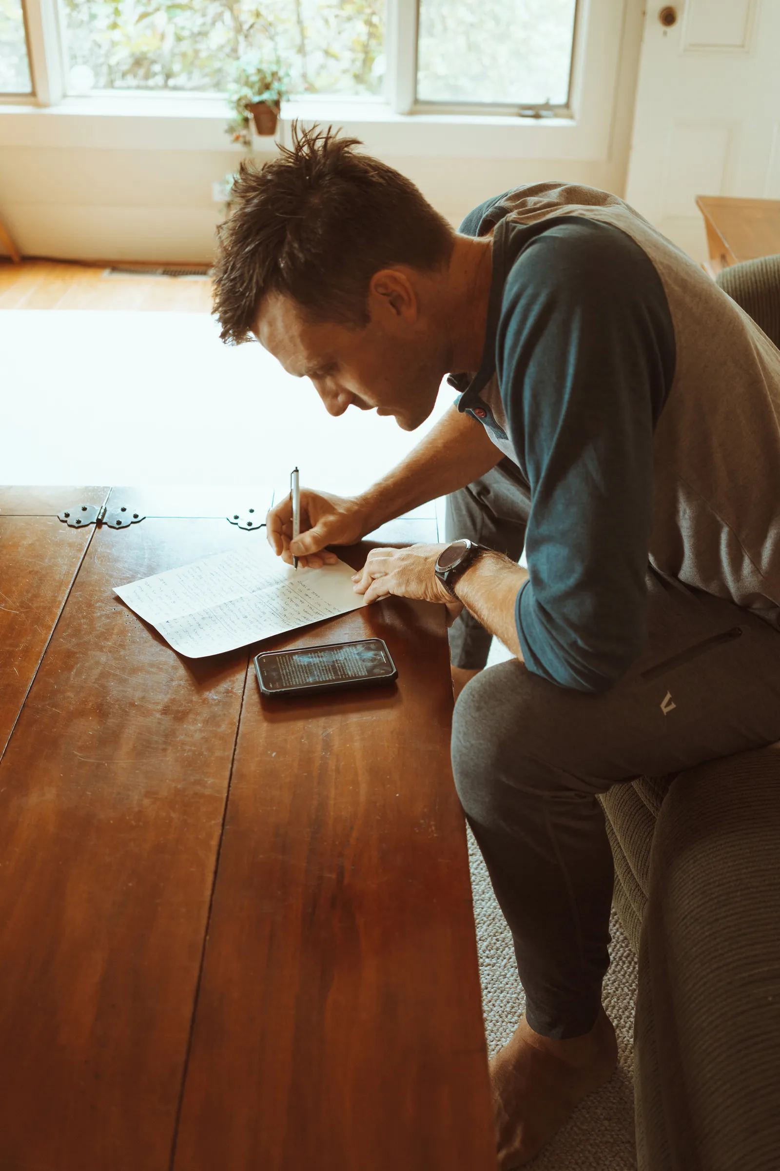 Groom writing vows