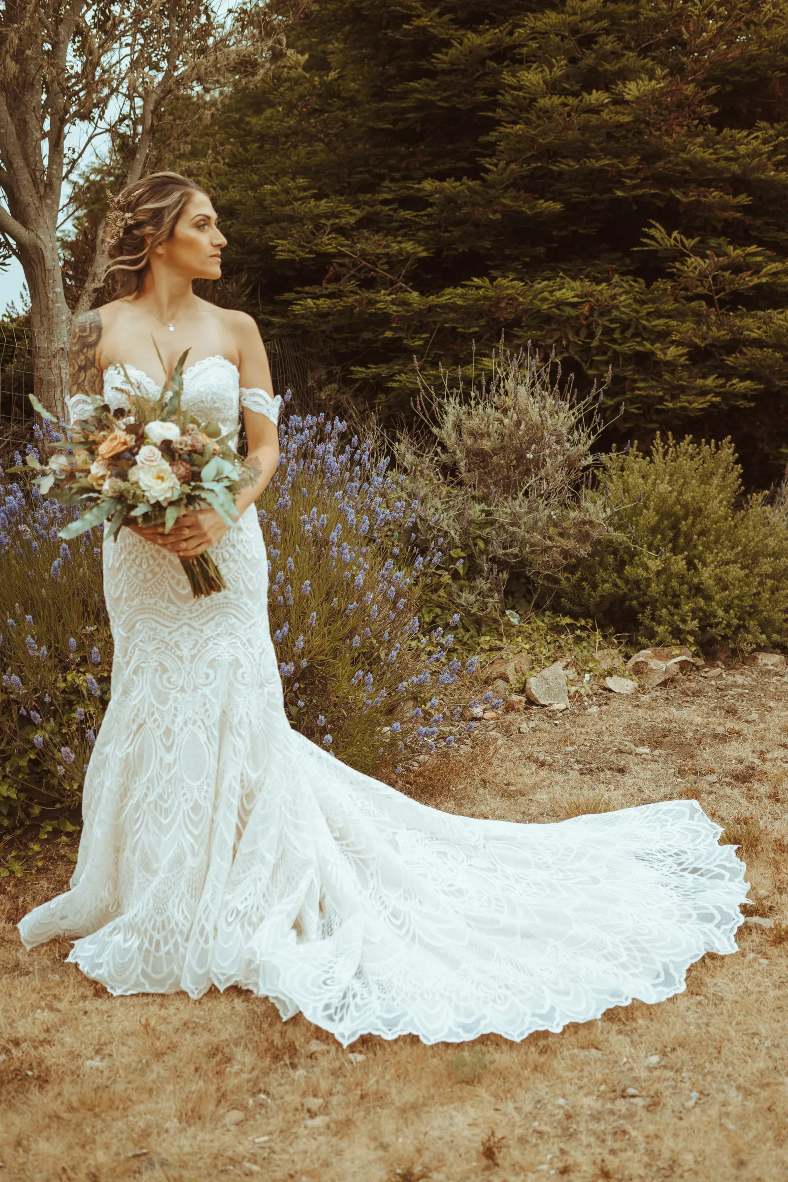 Bride taking wedding photos with flowers