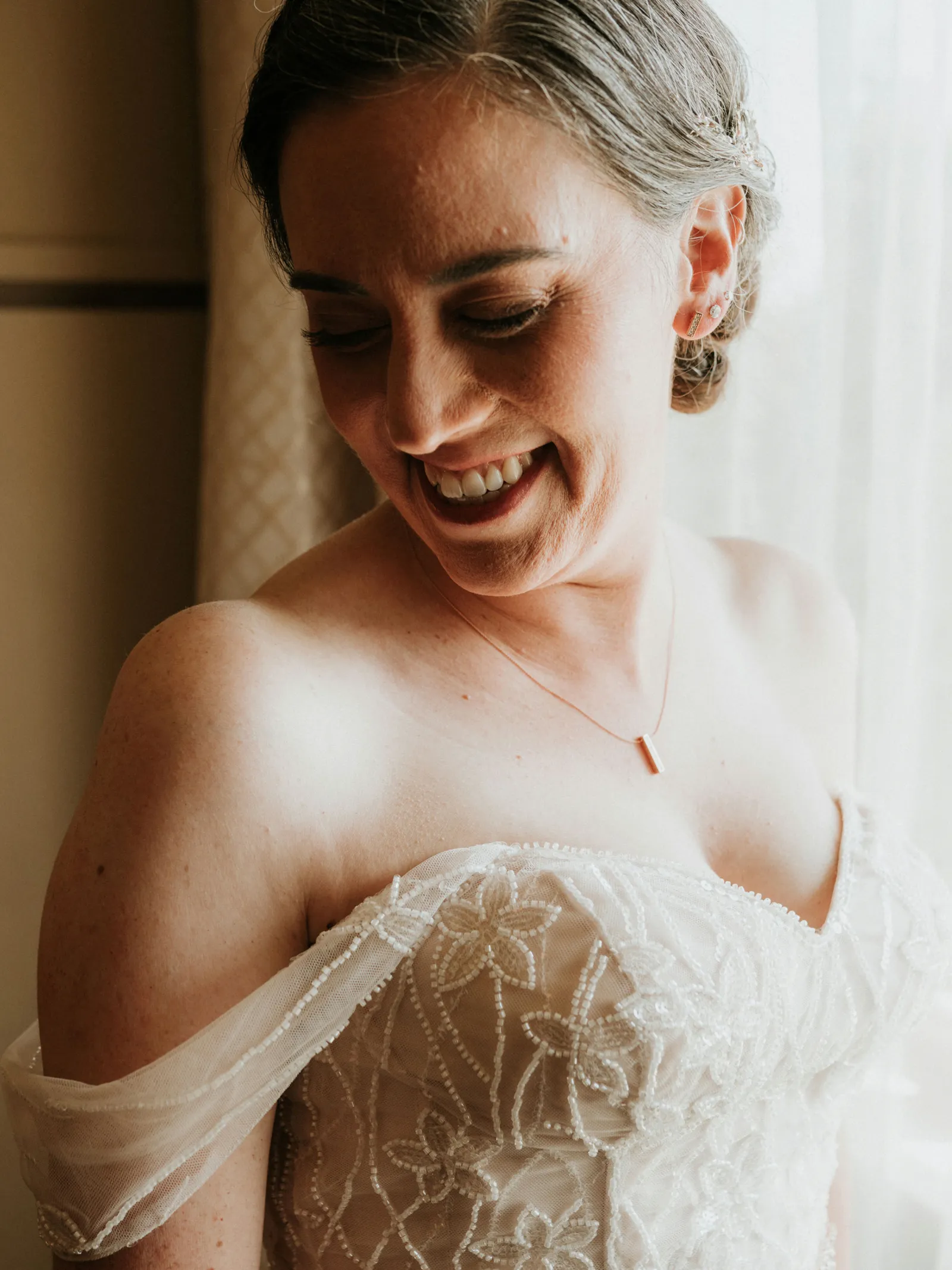 Up close photo of a bride smiling