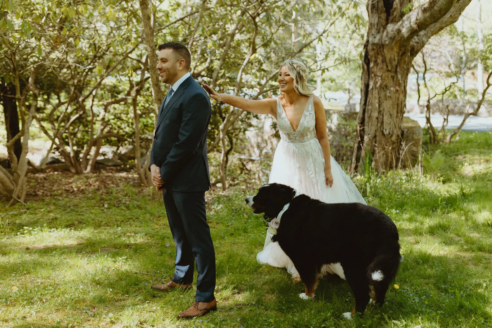 Bride doing a first look with her husband outside.