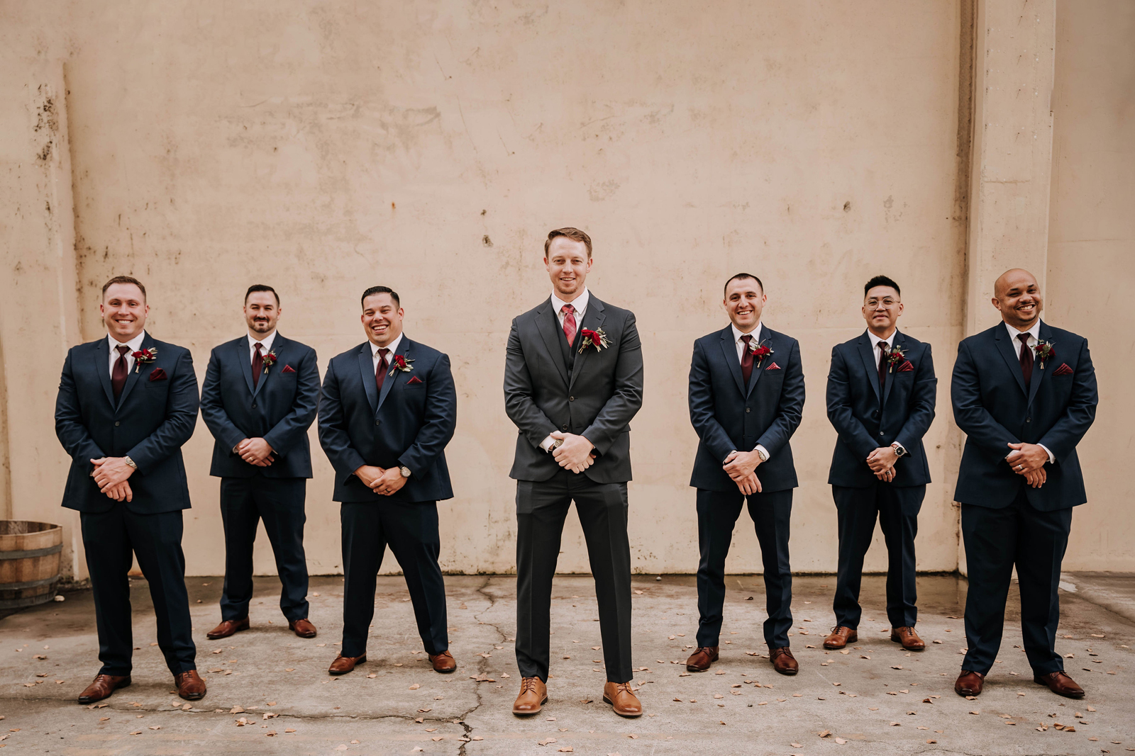 Groom and groomsmen posing for a photo.