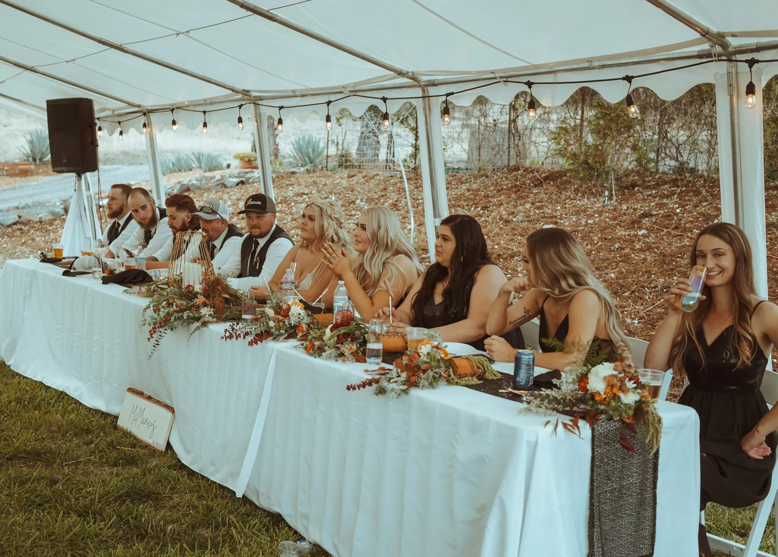 Photo of the large table for the bride and groom, and their wedding party.