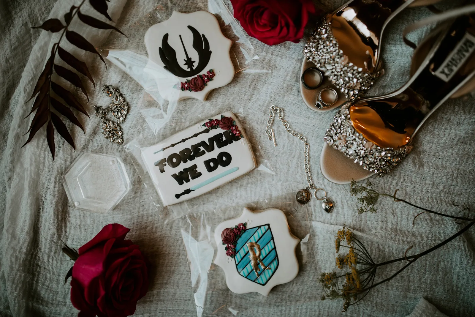 Harry Potter inspired cookies and badges for wedding.