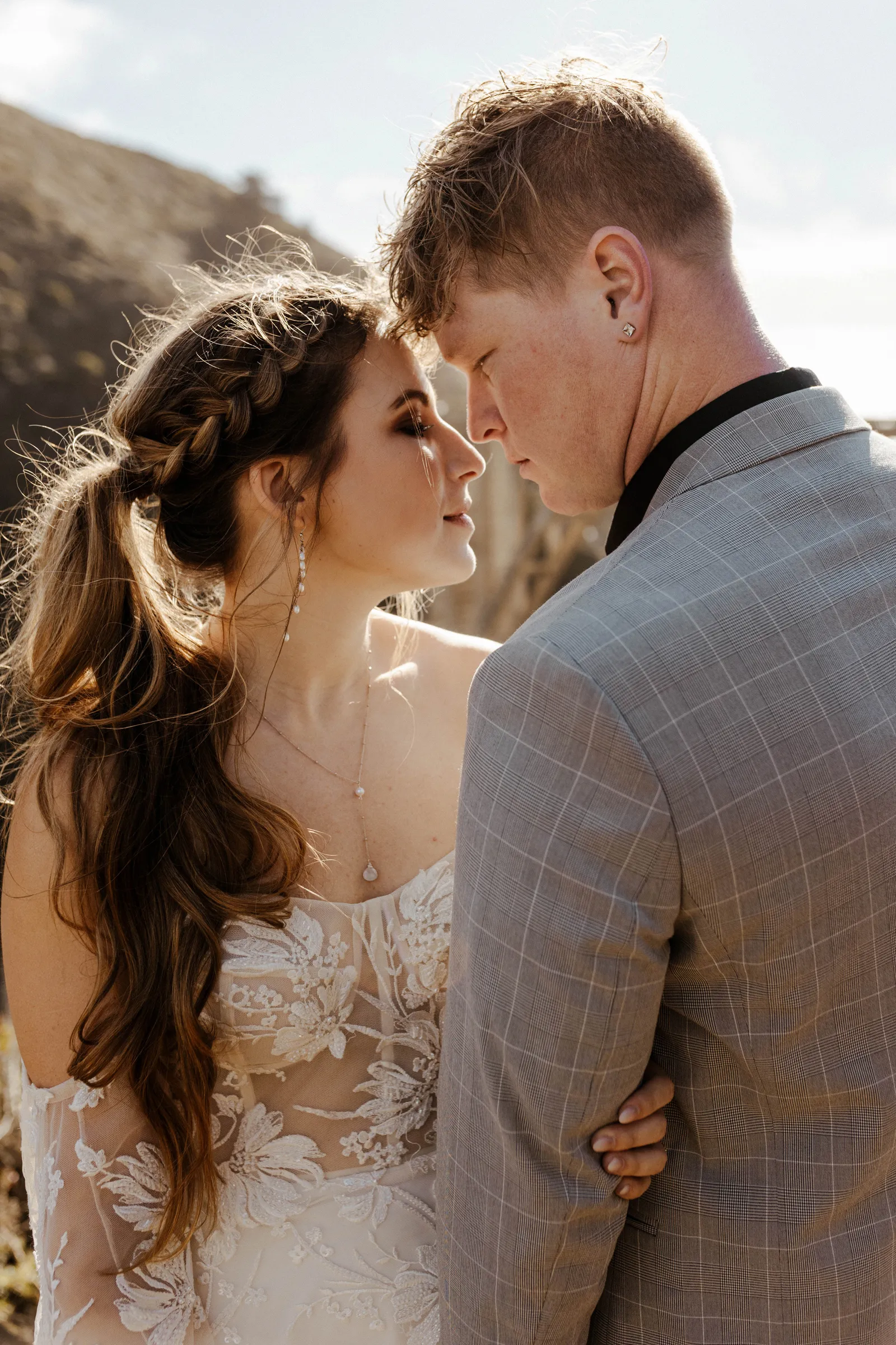 Bride and groom about to kiss.