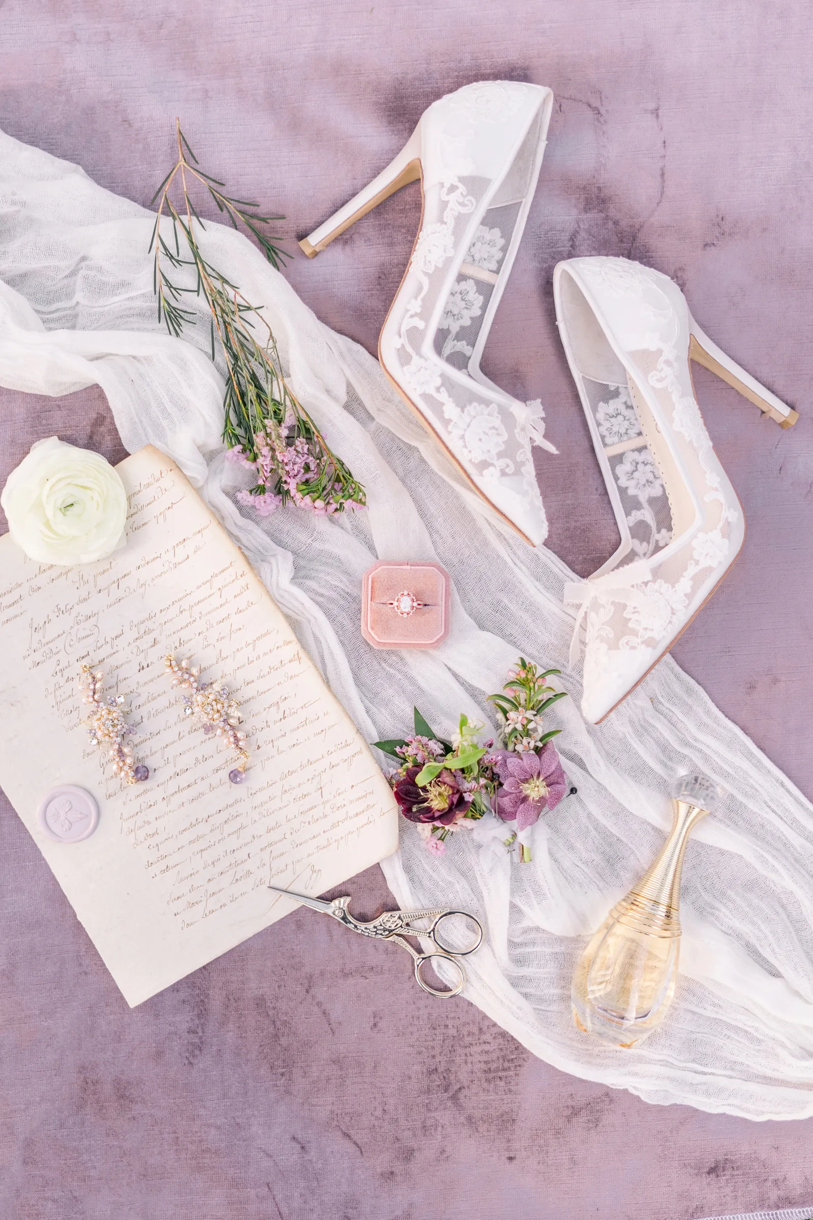 Lavender and lilac stationary, jewelry and shoes.