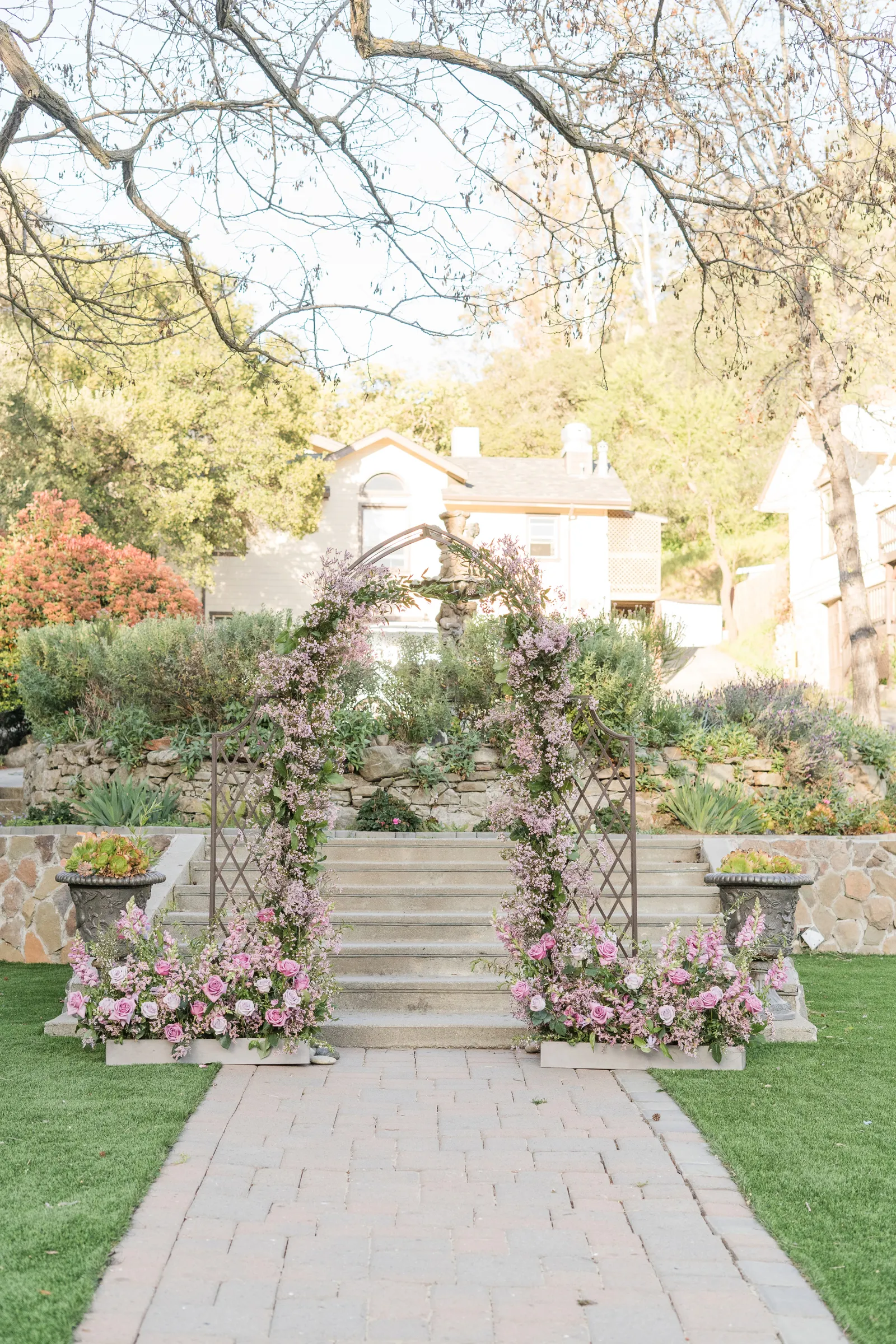 Entryway to an altar with roses lining the outline.