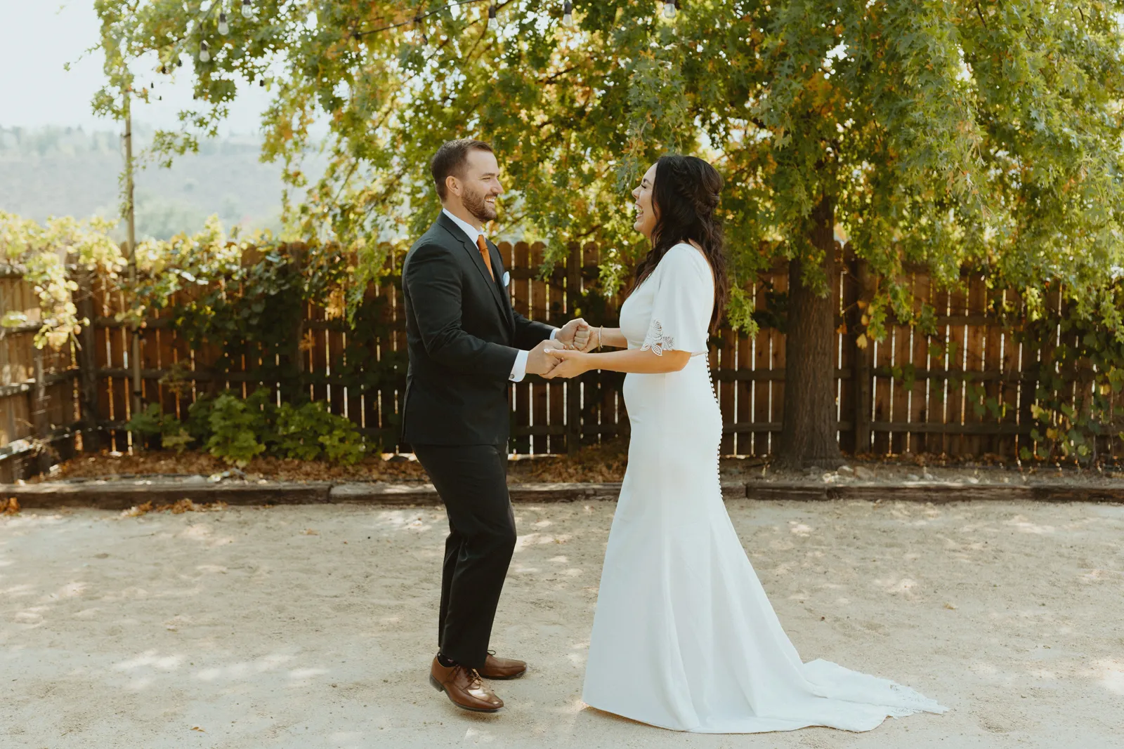 Bride and groom embracing for their first look.