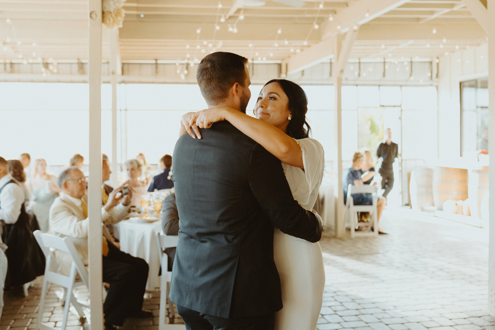 Bride and groom doing their first dance together as a couple.