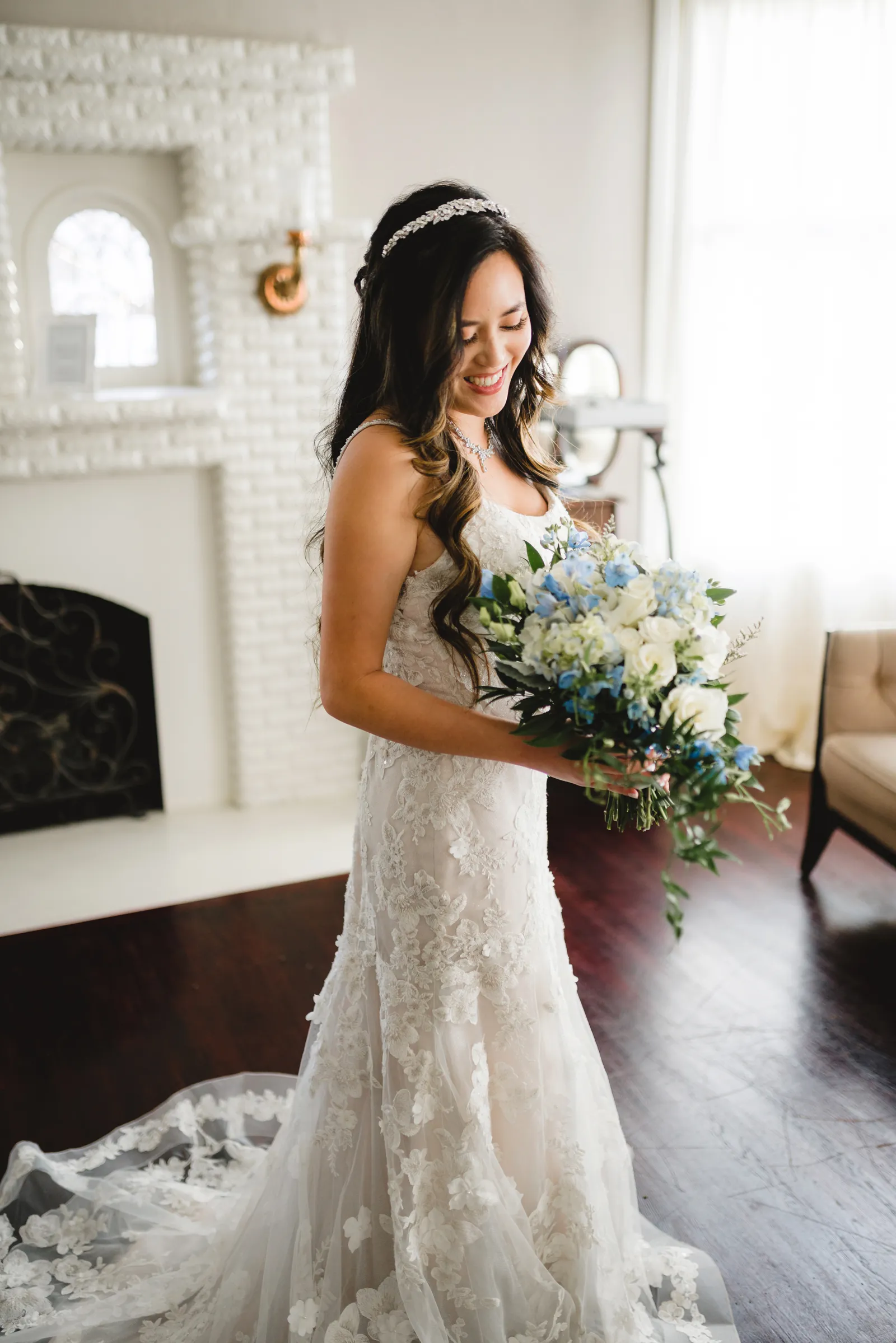 Close up photo of a bride holding flowers.