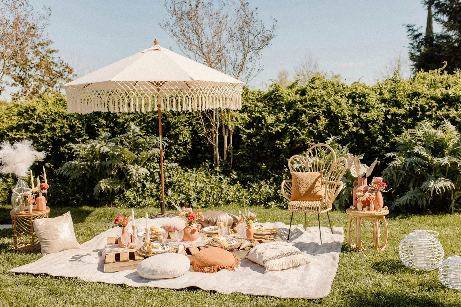 Photo of a pastel set up of an outdoor picnic.