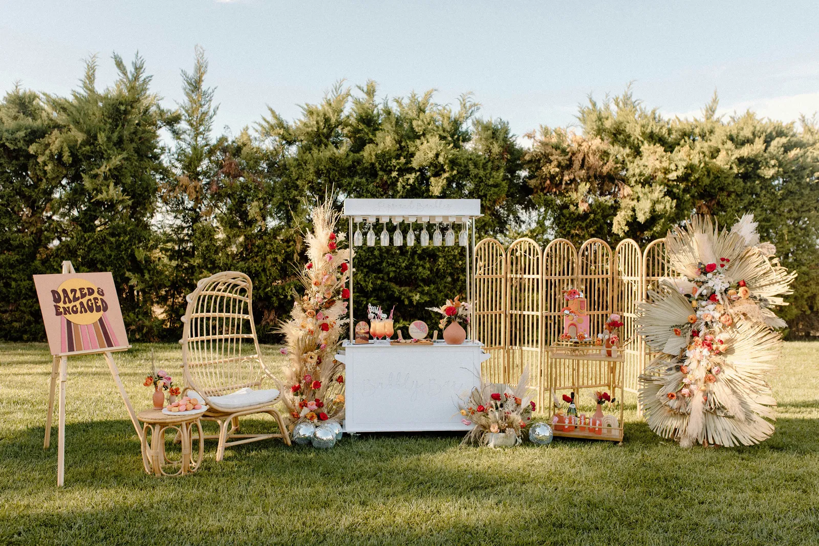 Far away photo of an outdoor mobile bar with drinks.