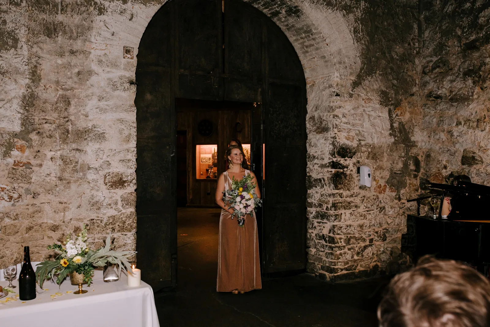 Bride-to-be about to walk into her wedding at The Stone Room at the Miner's Foundry.