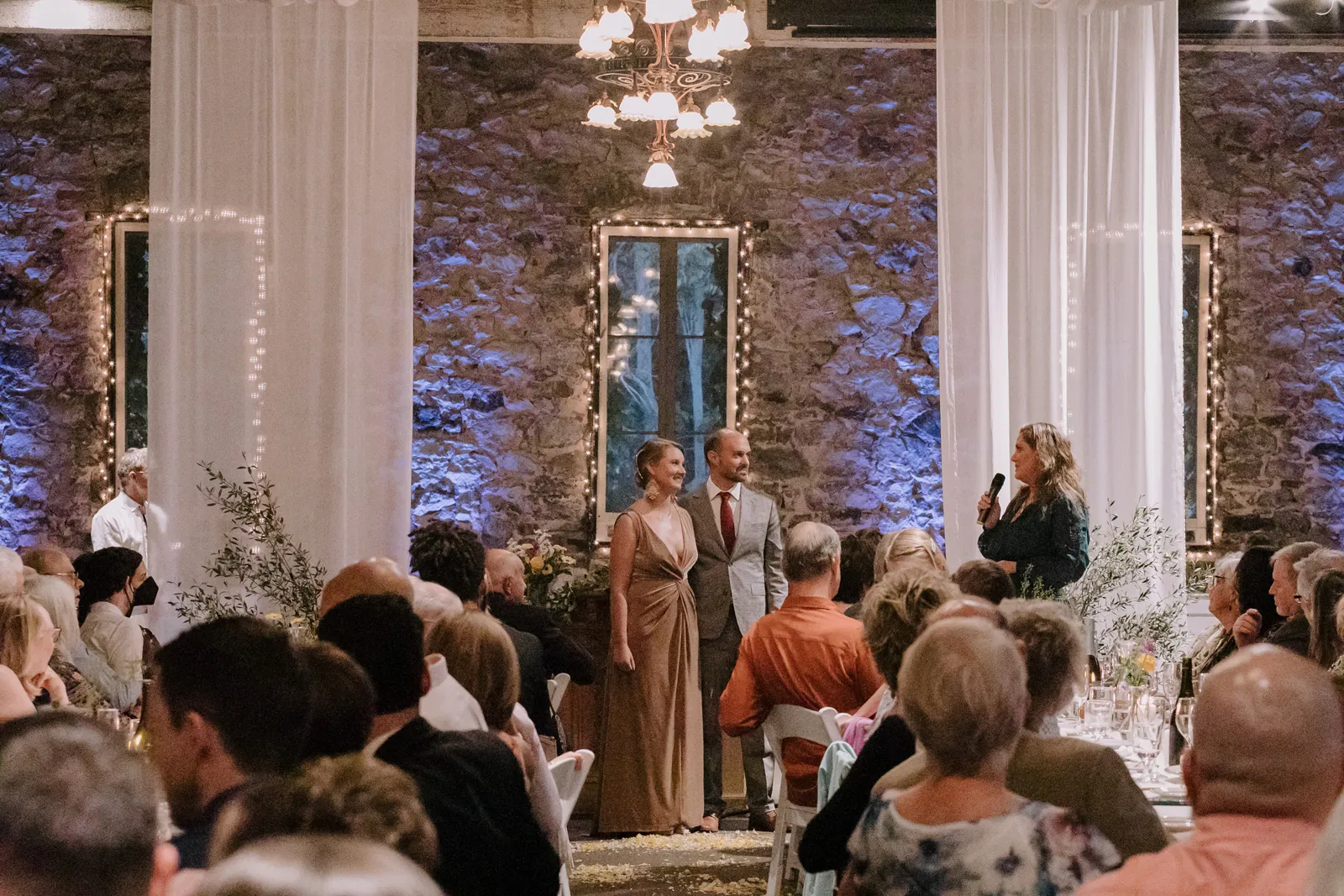 Bride and groom standing at the altar together.