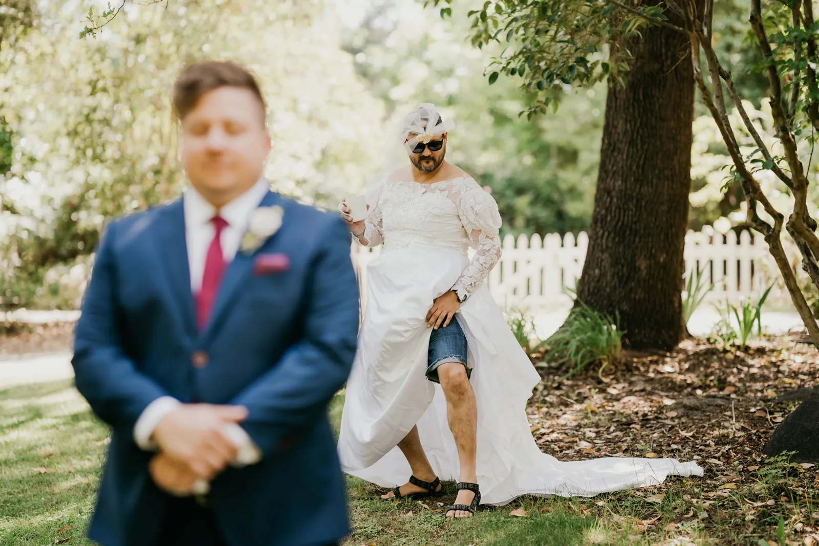 Groom waiting for his bride, when it's actually his friend in a dress.