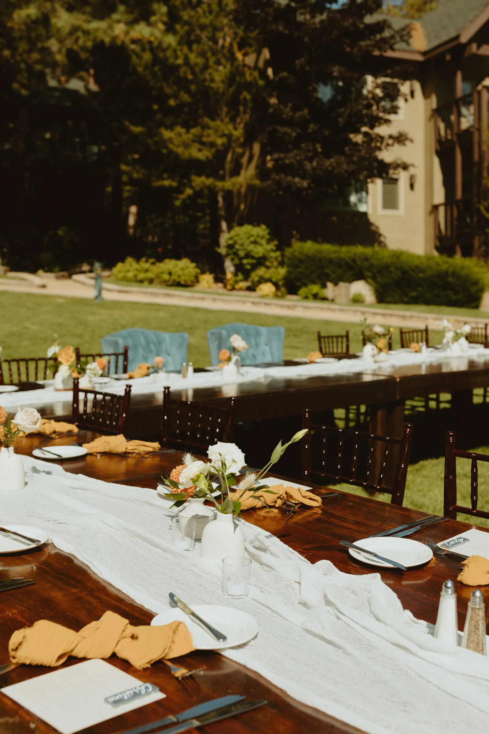 Photo of the reception venue with tables and chairs.