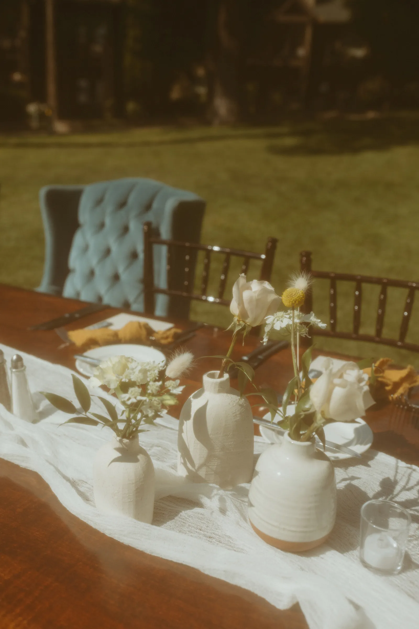 Vintage photo of the bride and groom's chairs for the reception.