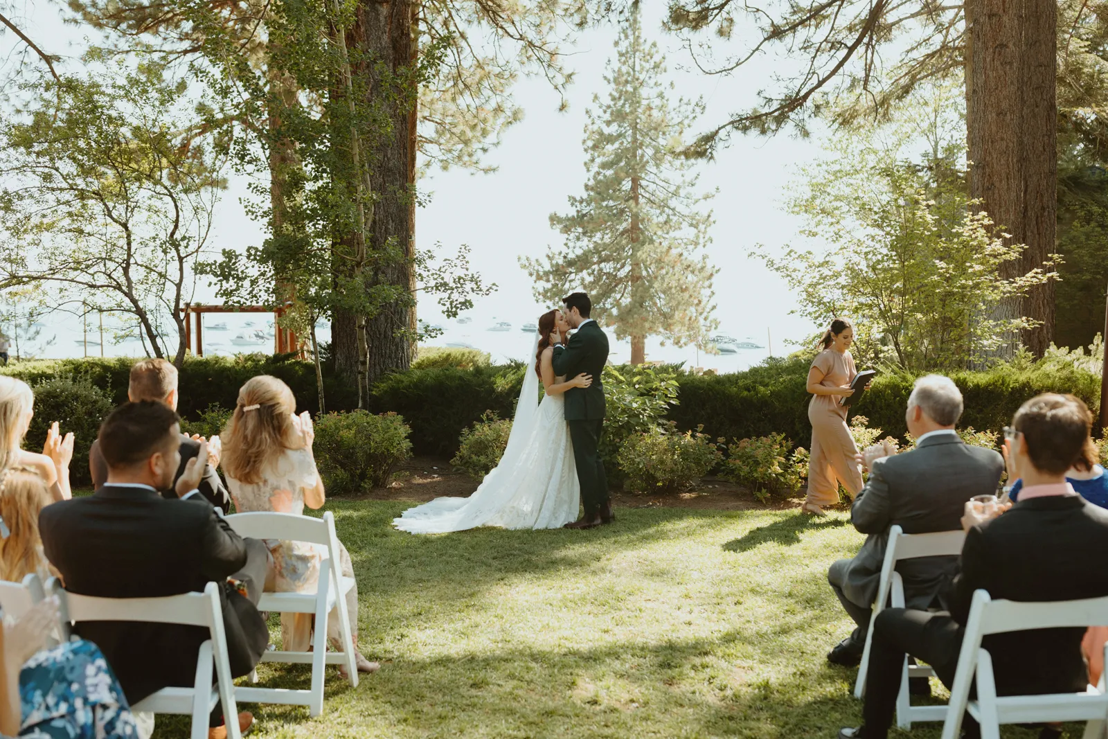 Bride and groom kissing after saying "I do".