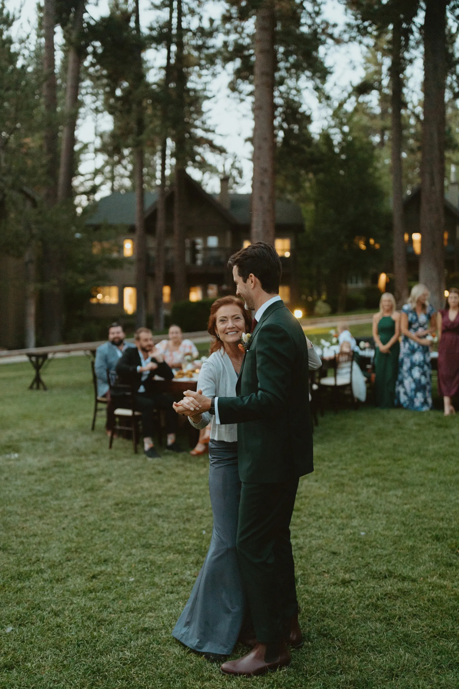 Groom dancing with his mom.