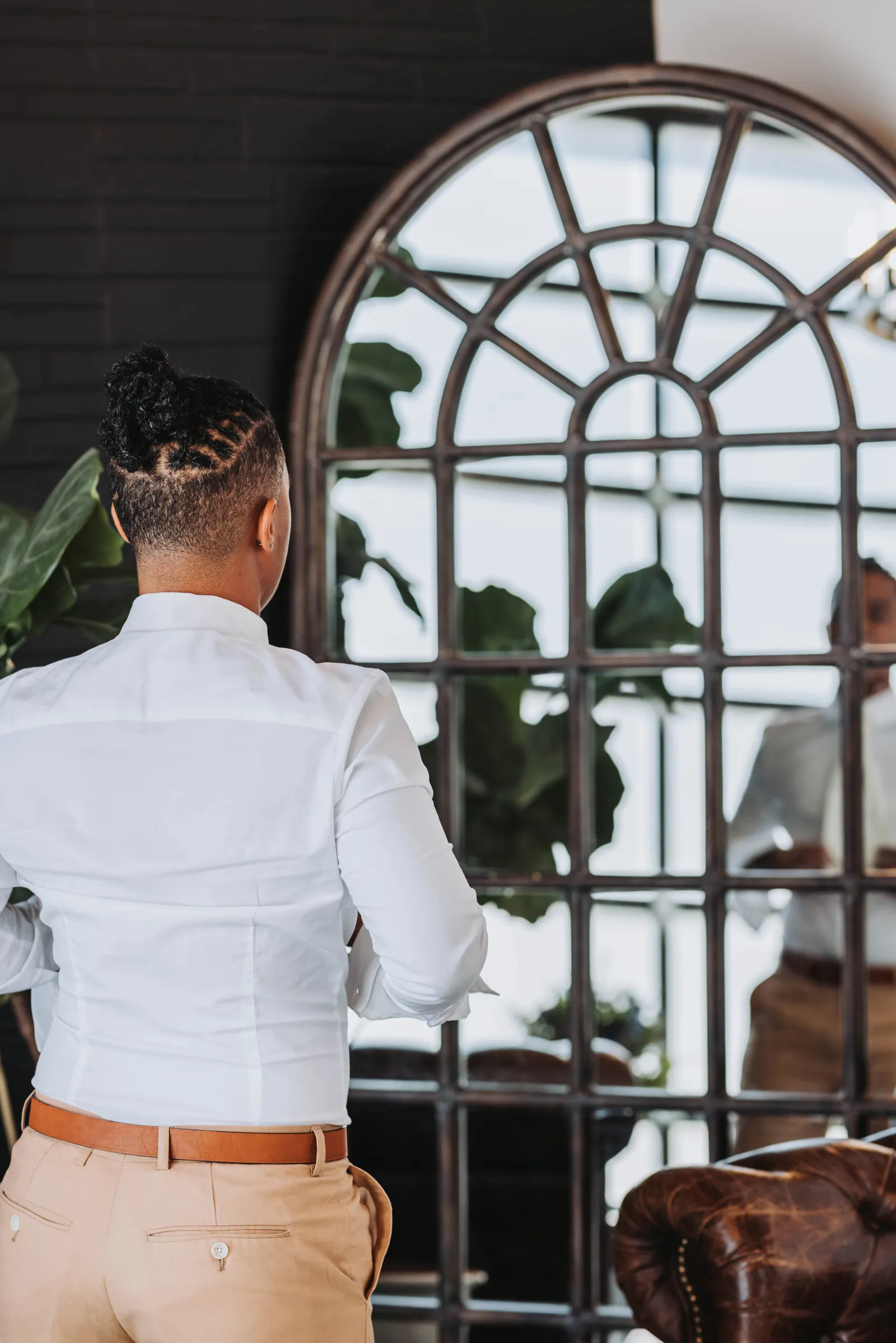 Bride-to-be getting ready in the mirror at The BLOC Venue.