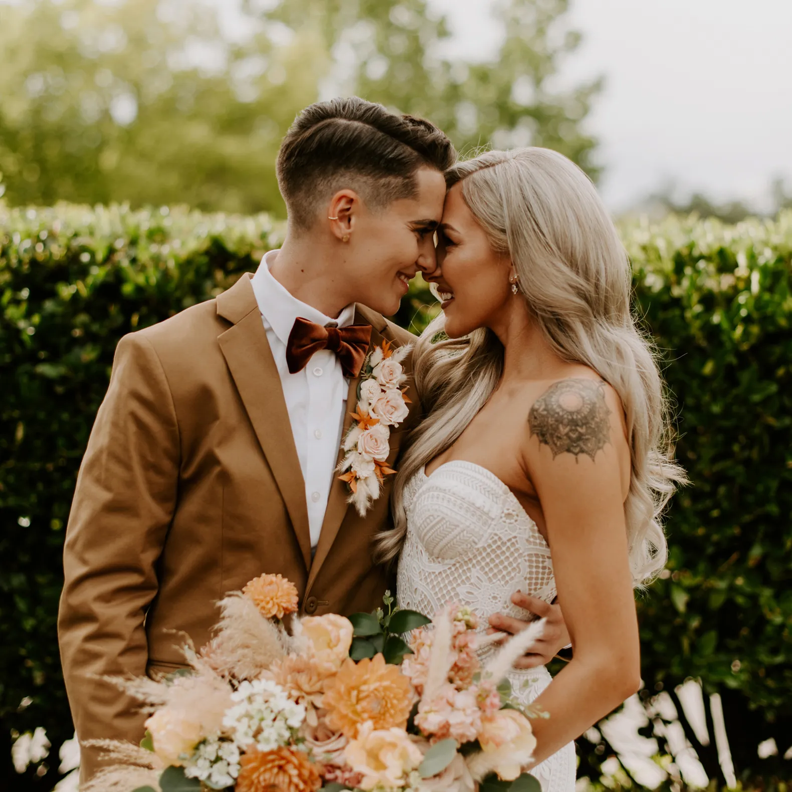 Newlyweds taking wedding photos with Captured by Kay at Timber Creek Ballroom.