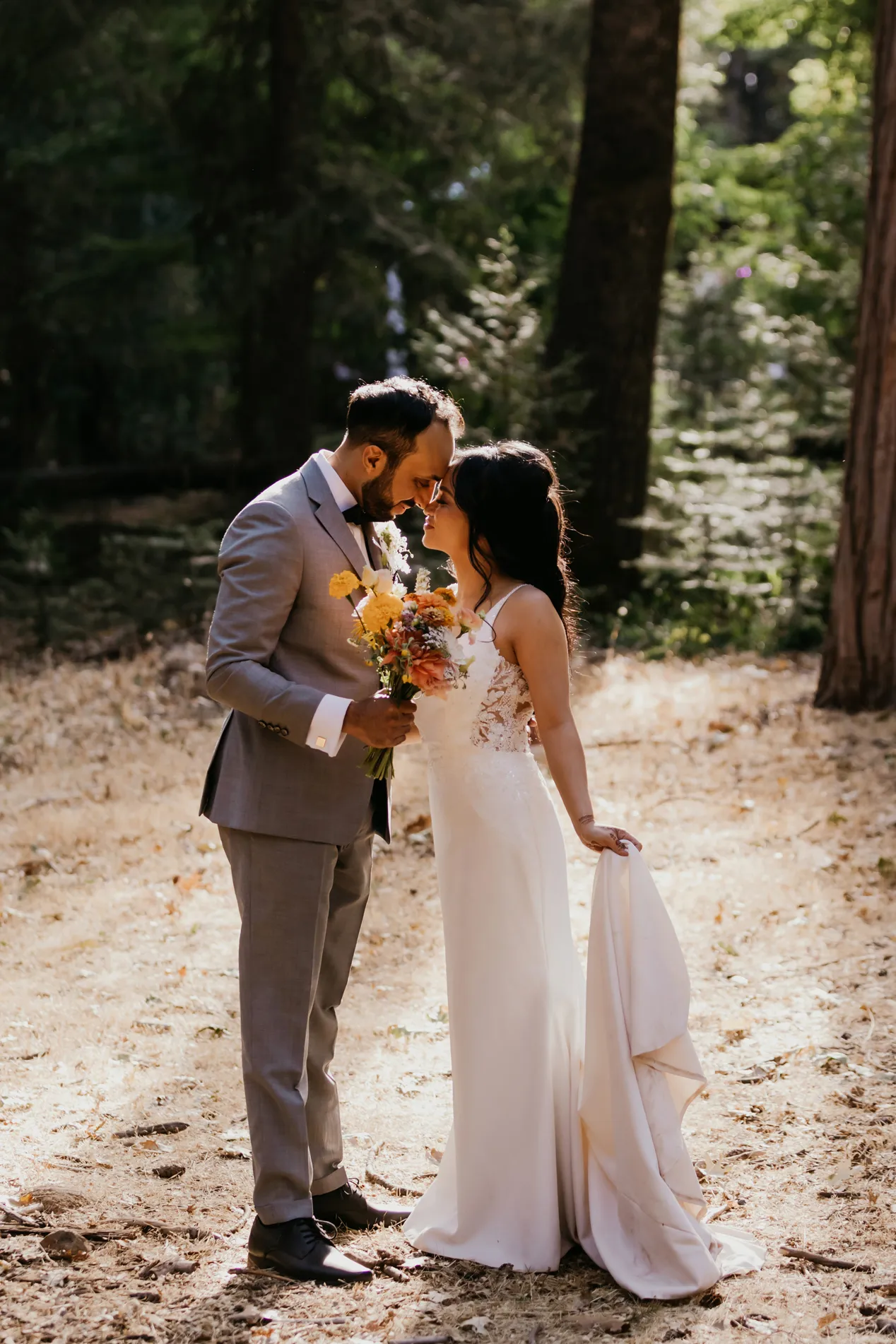 Bride and groom taking wedding photos with Danielle Alysse Photography for their Lake Tahoe Wedding.