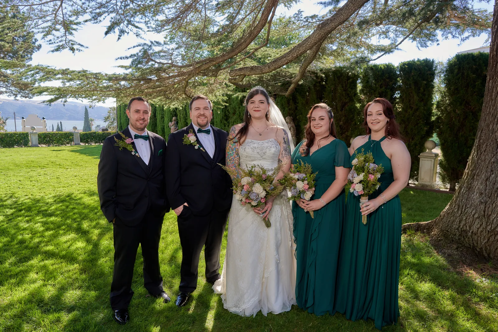 Bridal party posing with JB Wedding Photography.