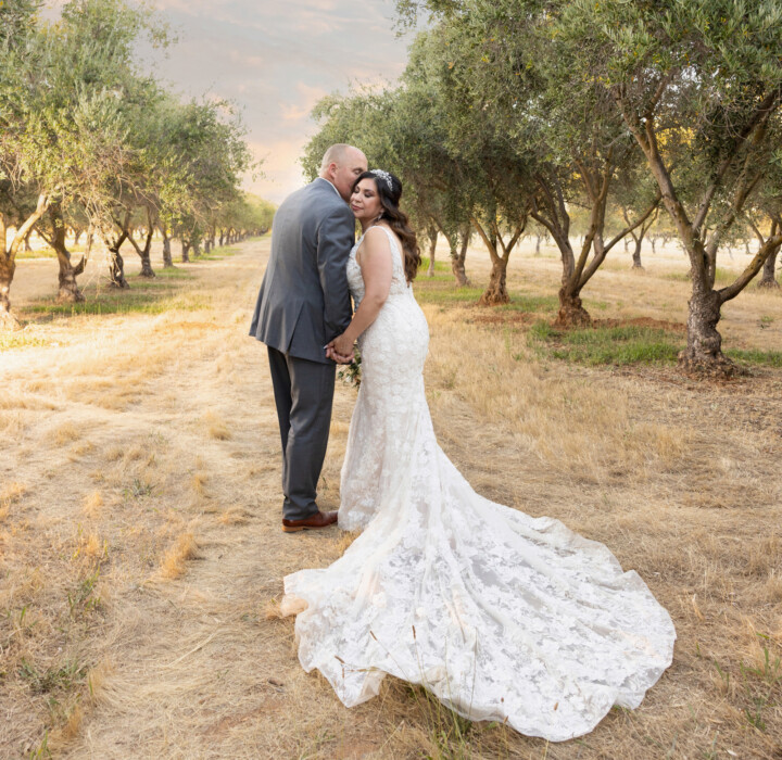 Newlyweds taking wedding photos in Sacramento at the Wolfe Heights Estate.