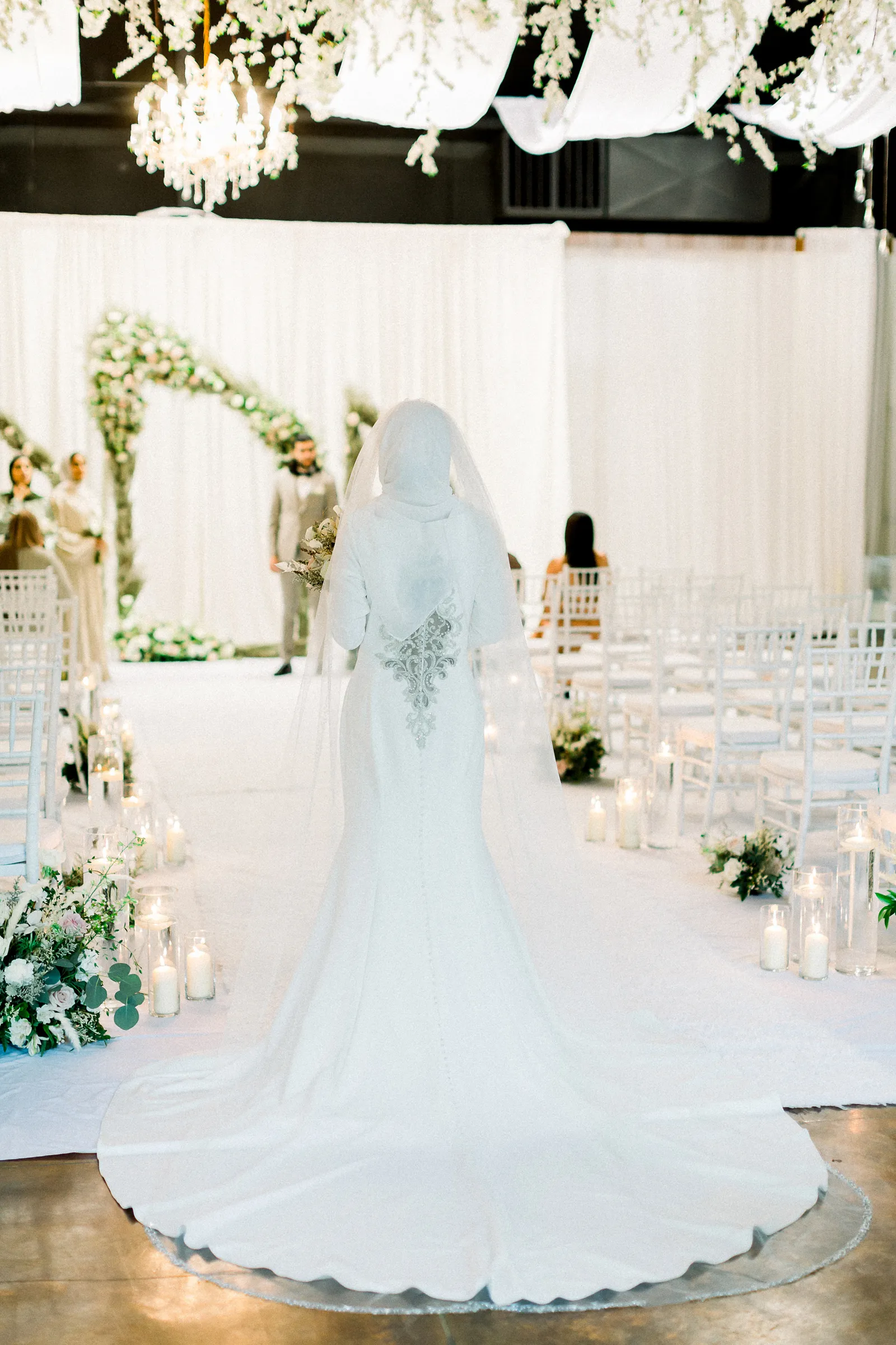 Bride-to-be model walking down the aisle at The Palms.