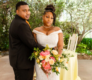 Bride and groom standing together at Gold Hill Gardens styled shoot.