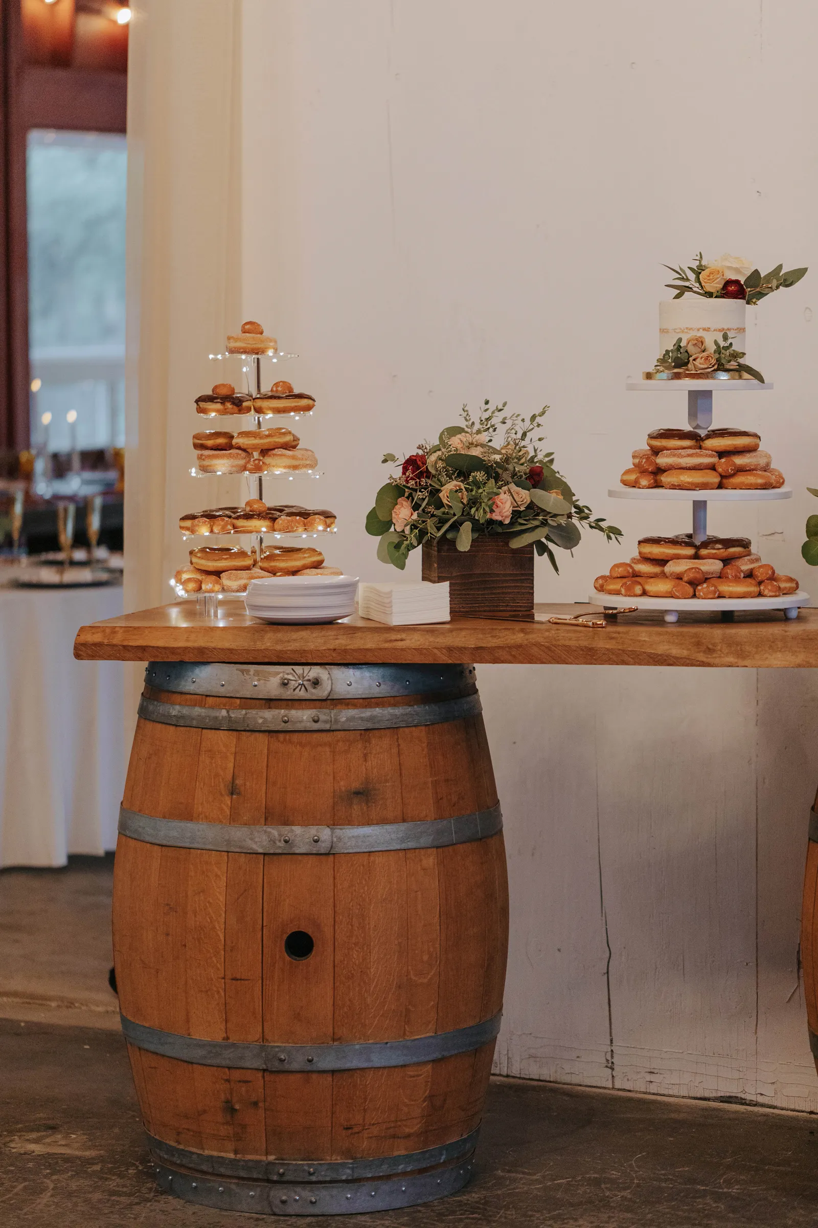 Donut bar at Abby and Gerardo's romantic outdoor barn wedding.