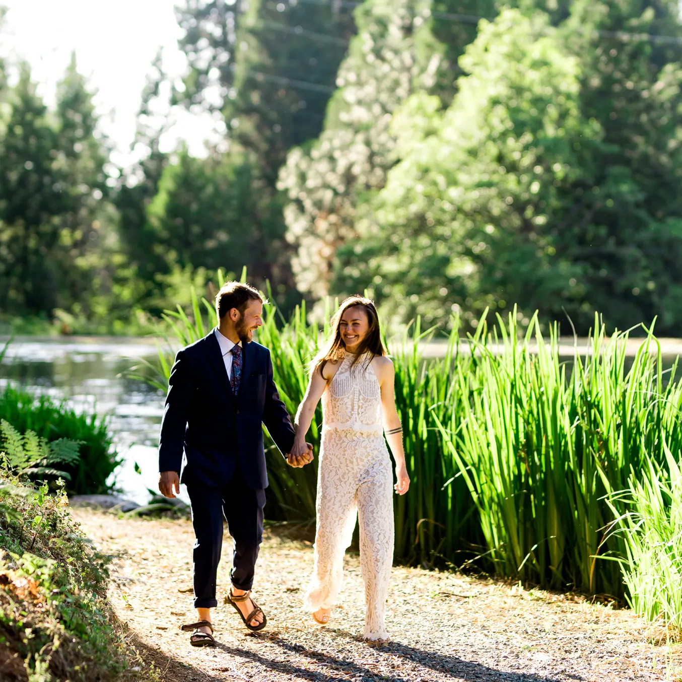 Cordi and Chuck walking into their unique lakeside wedding ceremony.