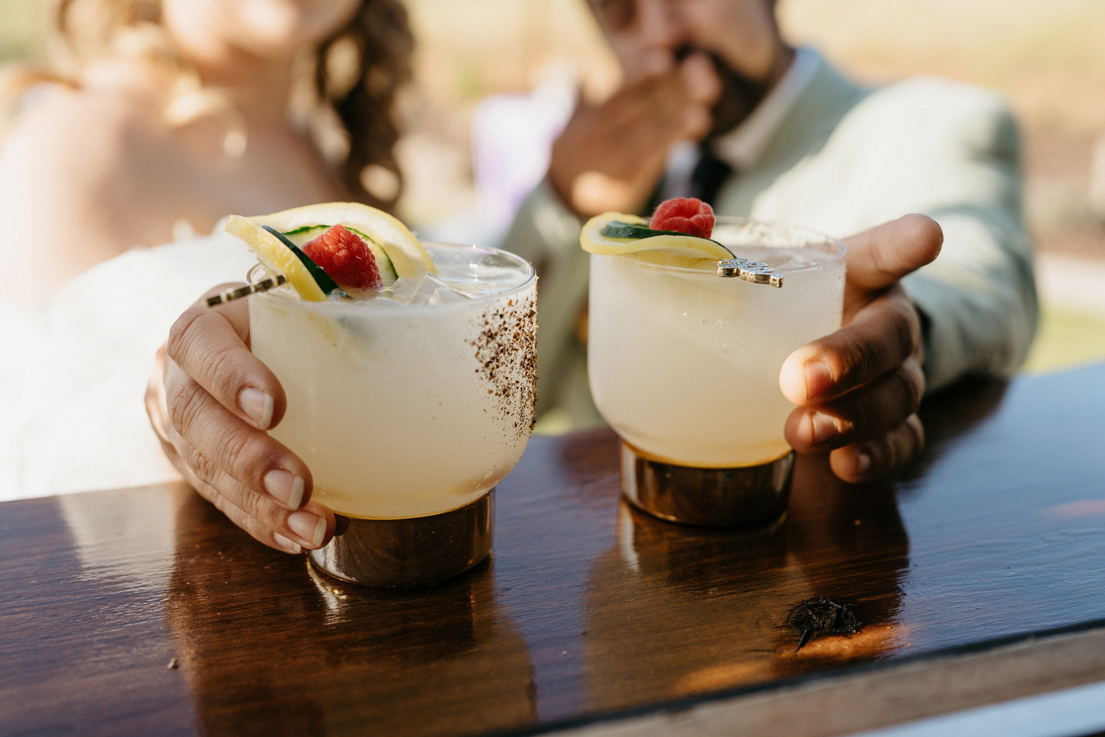 Bride and groom ordering cocktails from their mobile bar at a submitted styled shoot at Rubidoux Ridge Vineyard.