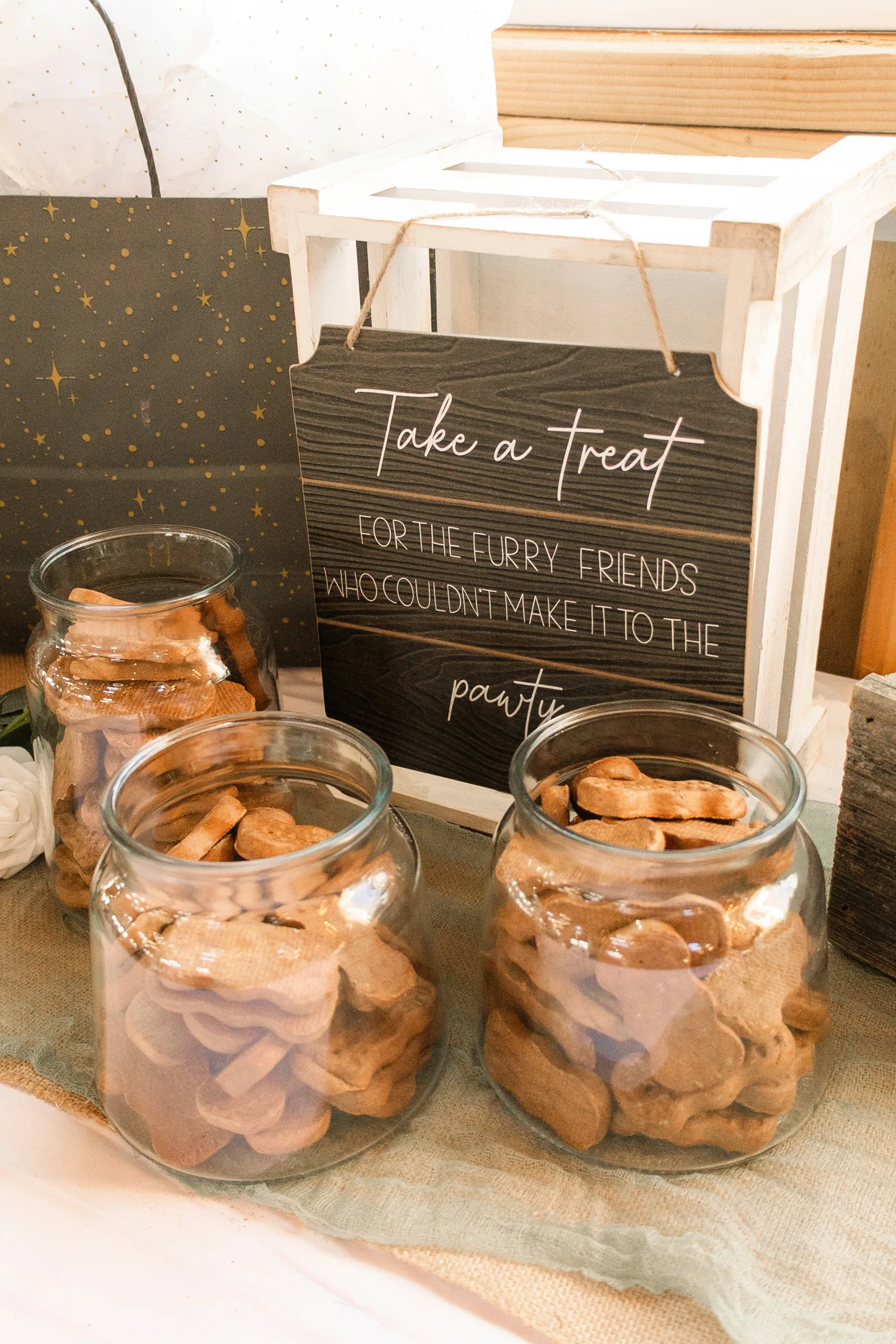 Fun treats for guests to pick up at this elegant barn wedding reception.