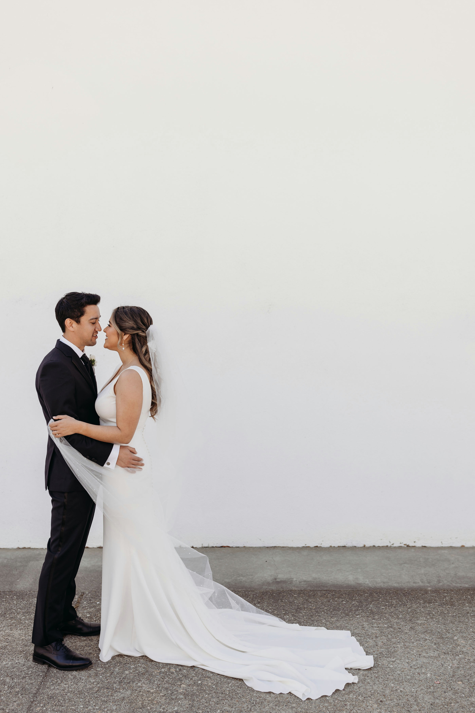 Bride and groom after doing their first look at their winery wedding.