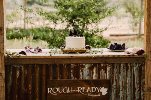 Wedding cake at the rustic wedding venue.
