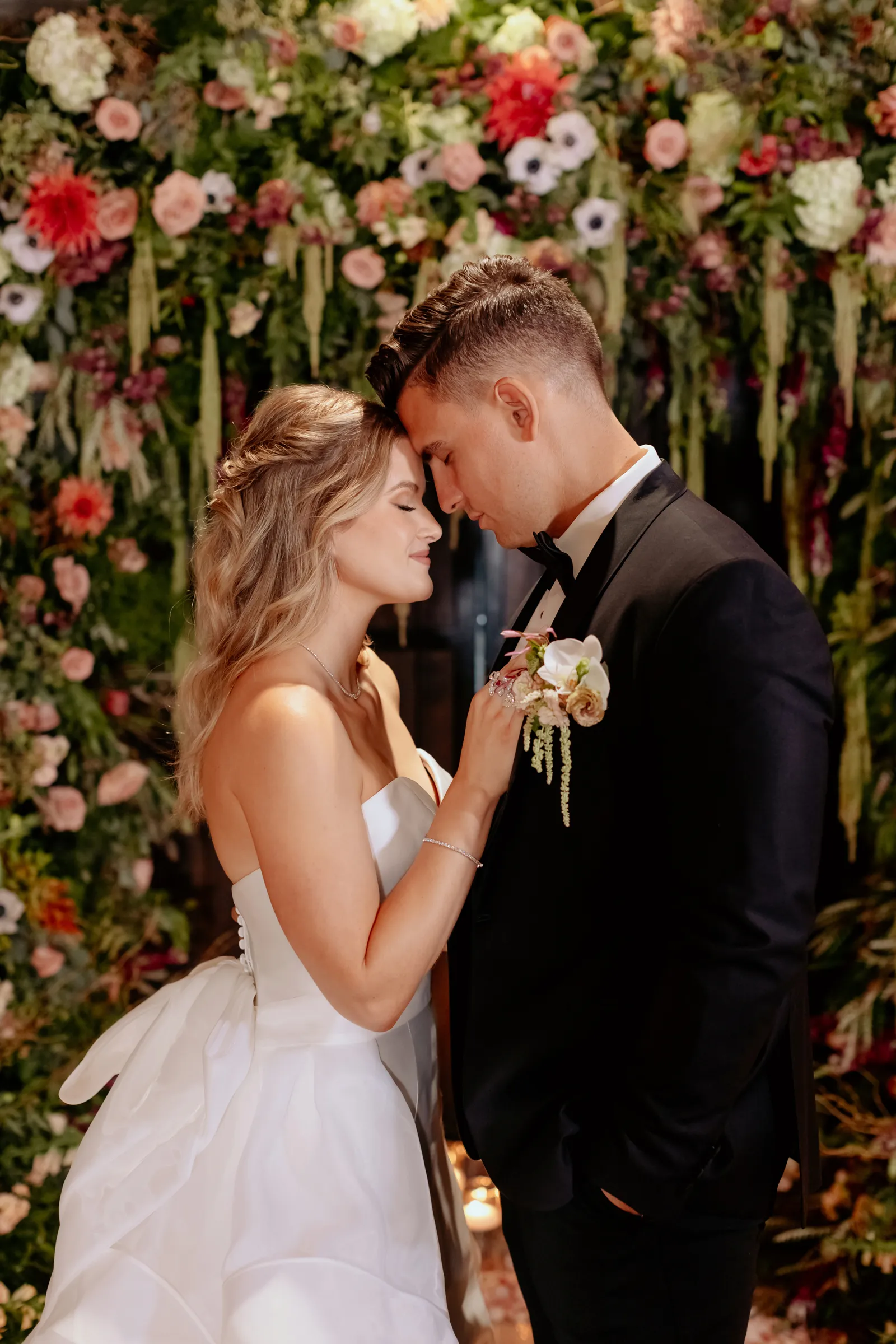 Bride and groom posing at Twin Rocks Estate Winery submitted styled shoot.