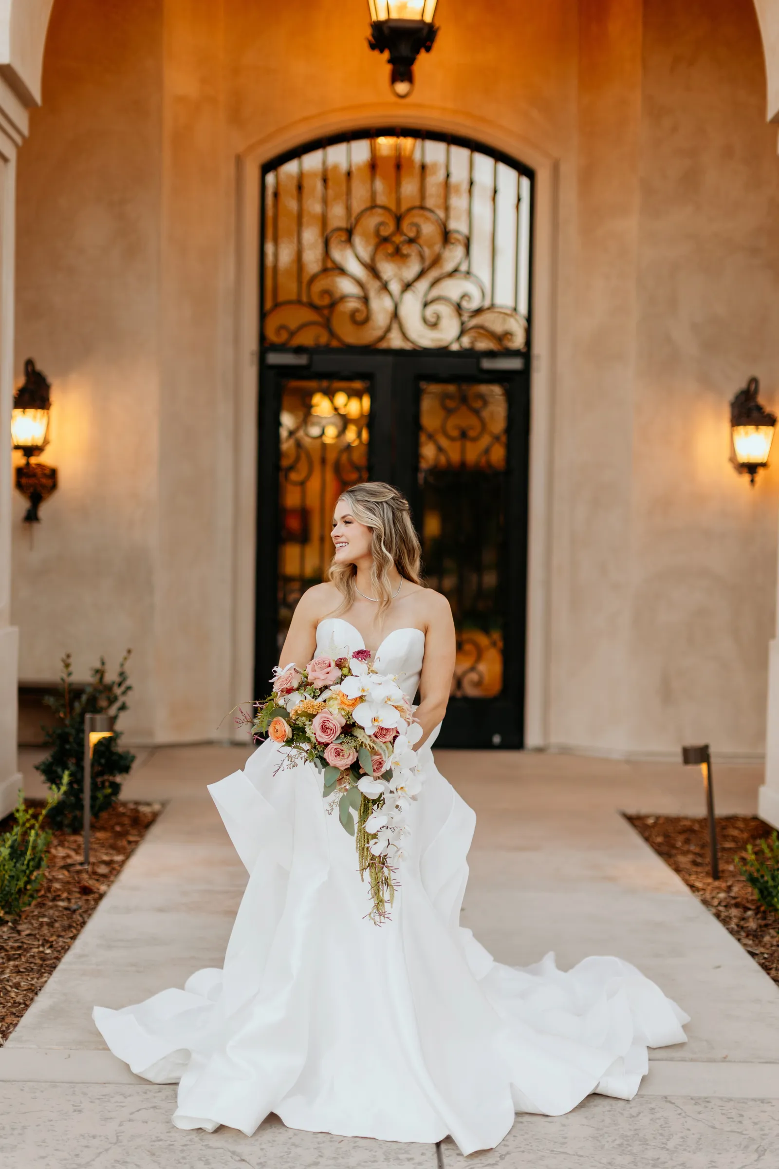 Bride taking wedding photos at Twin Rocks Estate Winery submitted styled shoot.