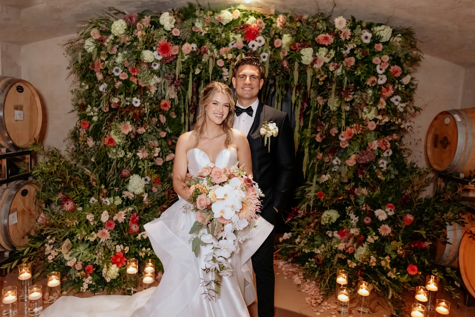 Newlyweds posing together at Twin Rocks Estate Winery submitted styled shoot.