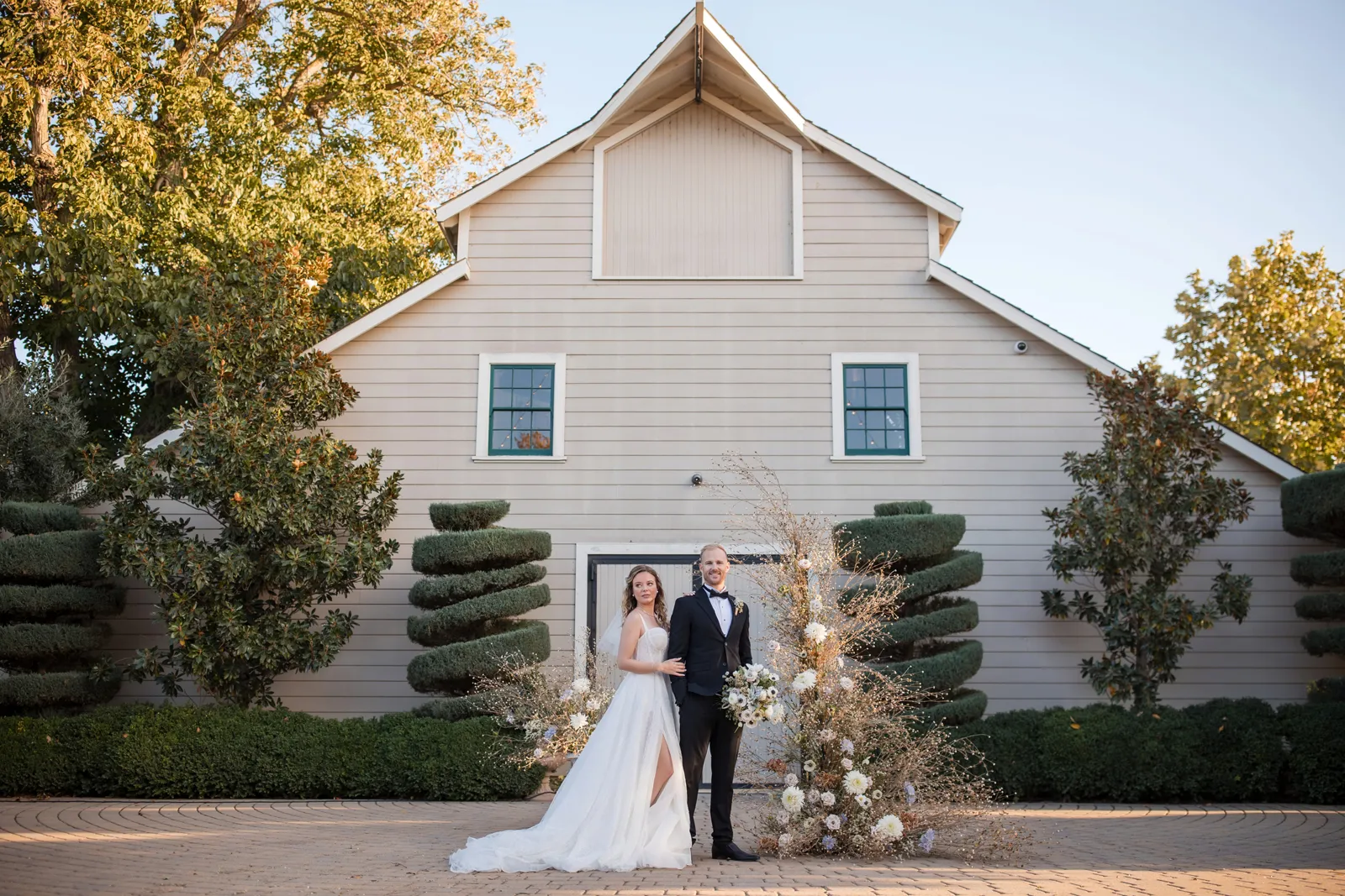 Bride and groom posing together at the submitted styled shoot at Scribner Bend Vineyards wedding venue.